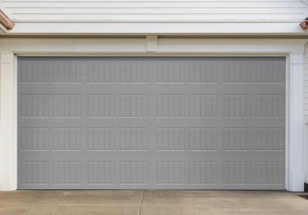 Gray recessed-panel double garage door with grooved detailing